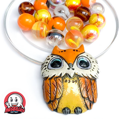 Gufo arancione in ceramica con 20 biglie gialle, arancioni e trasparenti - Collezione MieiBiglie